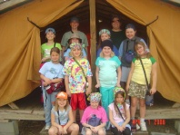 Troop standing in front of platform tent