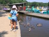 our girls feeding the geese and fish