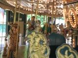 our girls riding the Merry-Go-Round