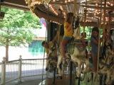 our girls riding the Merry-Go-Round